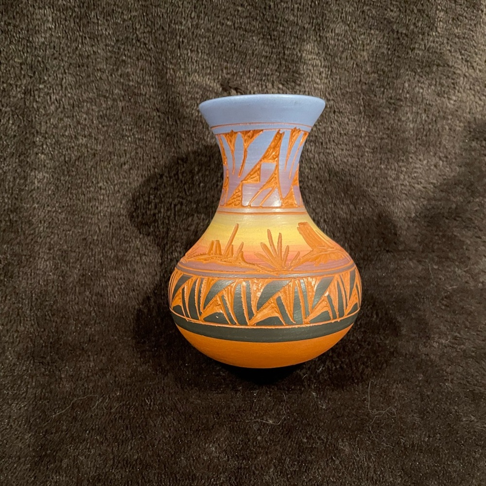 Navajo pottery. Signs by artist